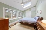 First level primary suite with beautiful woodland views